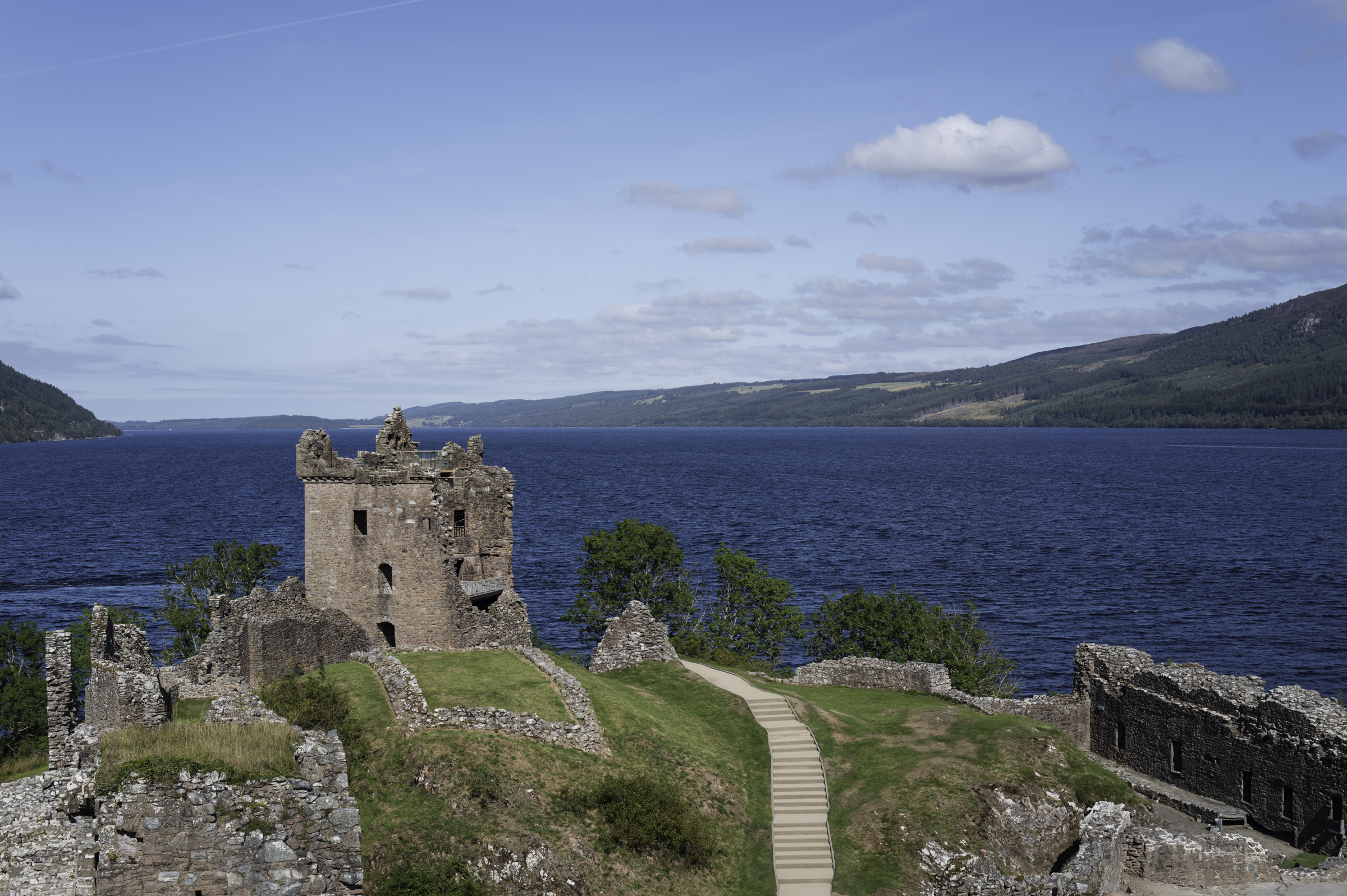 Urquhart Castle, with Loch Ness in the background.