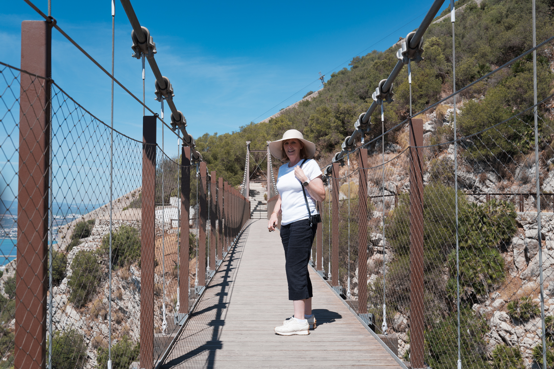 Andrea, crossing the Windsor Suspension Bridge on the Rock of Gibraltar.