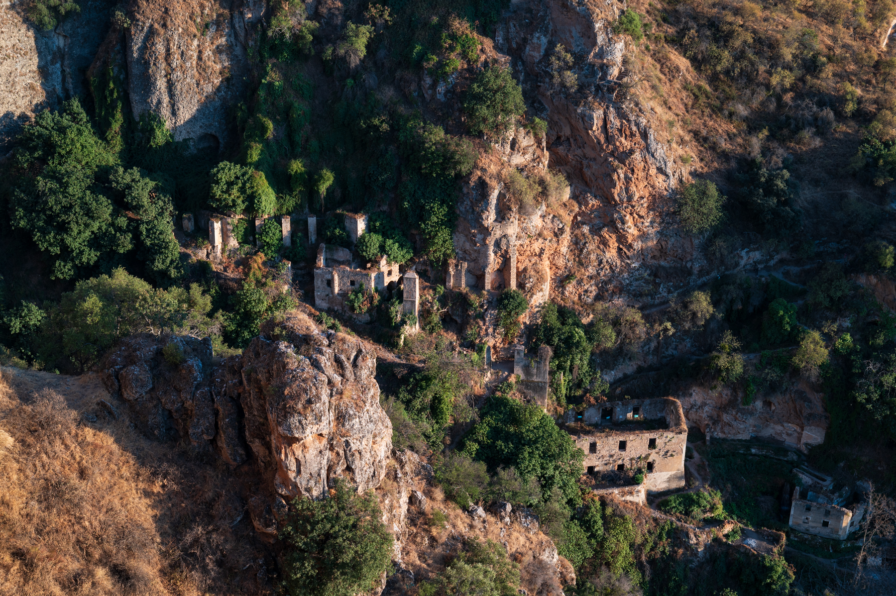 Ruins in the El Tajo gorge, viewed from the Plaza de España in Ronda.