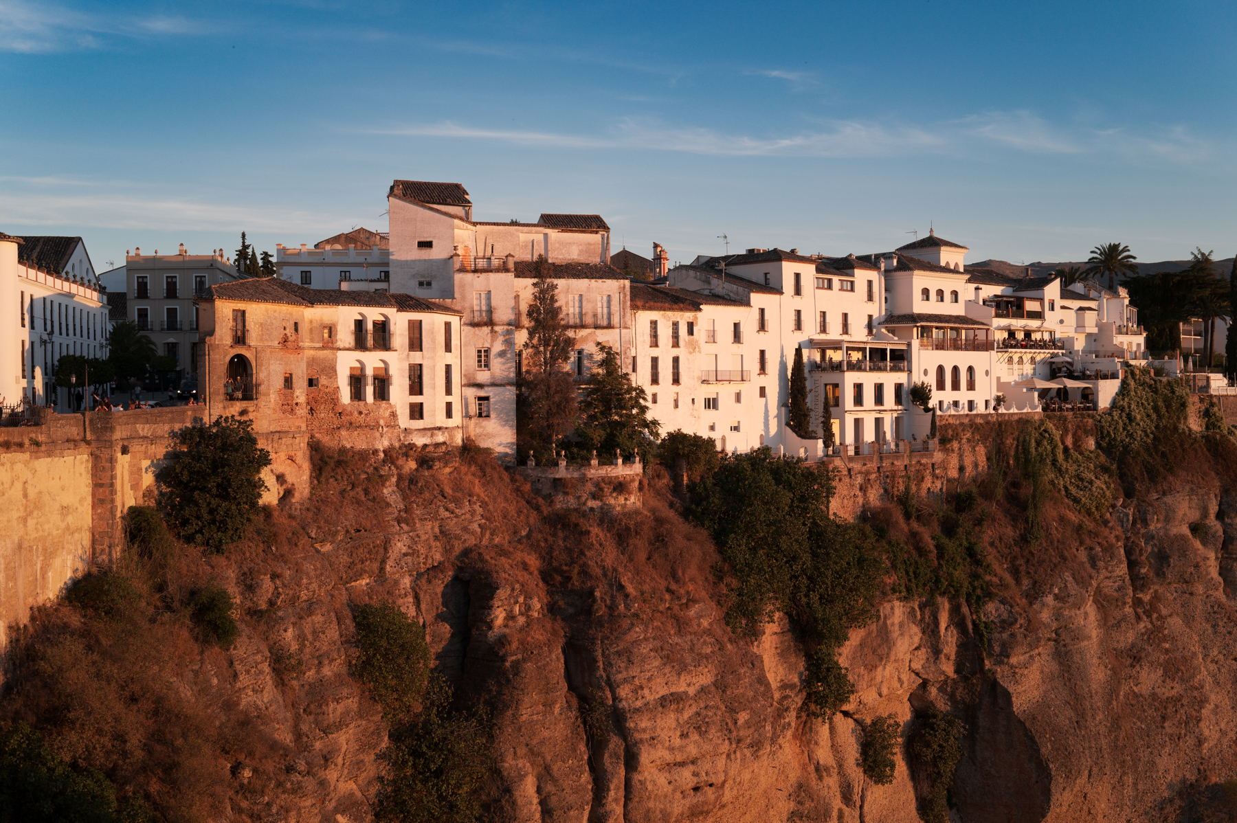 Ronda, bathed in sunset light.