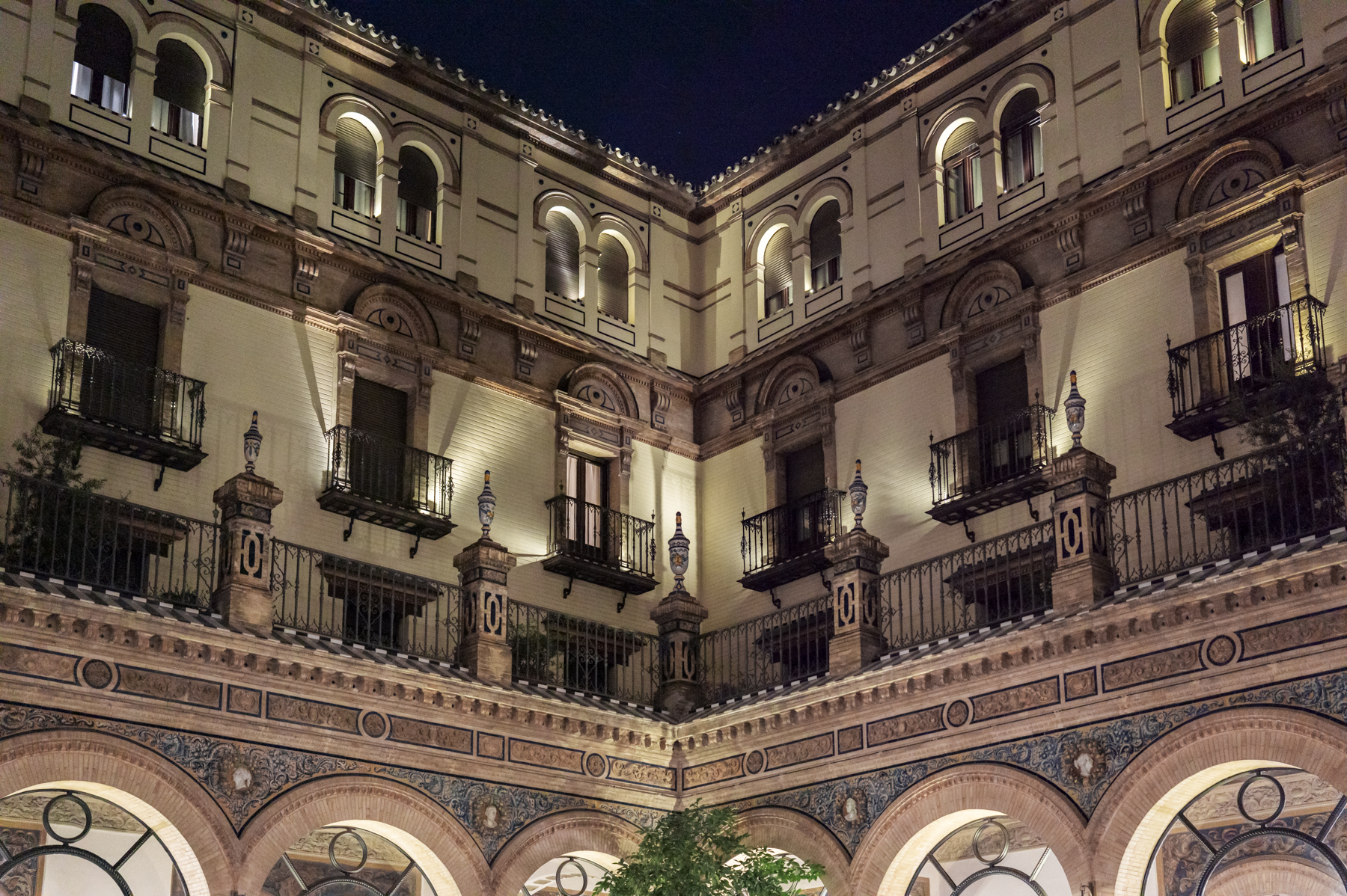 Looking up from the restaurant courtyard at the Alfonso XIII Hotel in Seville.
