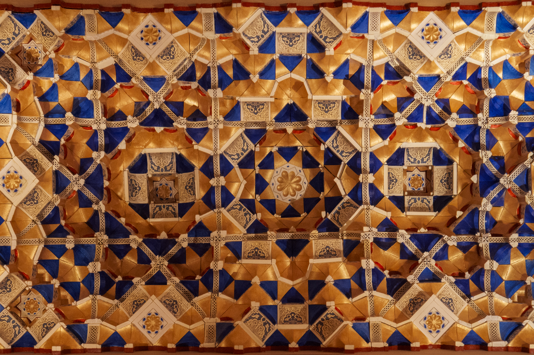 Ceiling design on display at the Museo de la Alhambra in Granada.