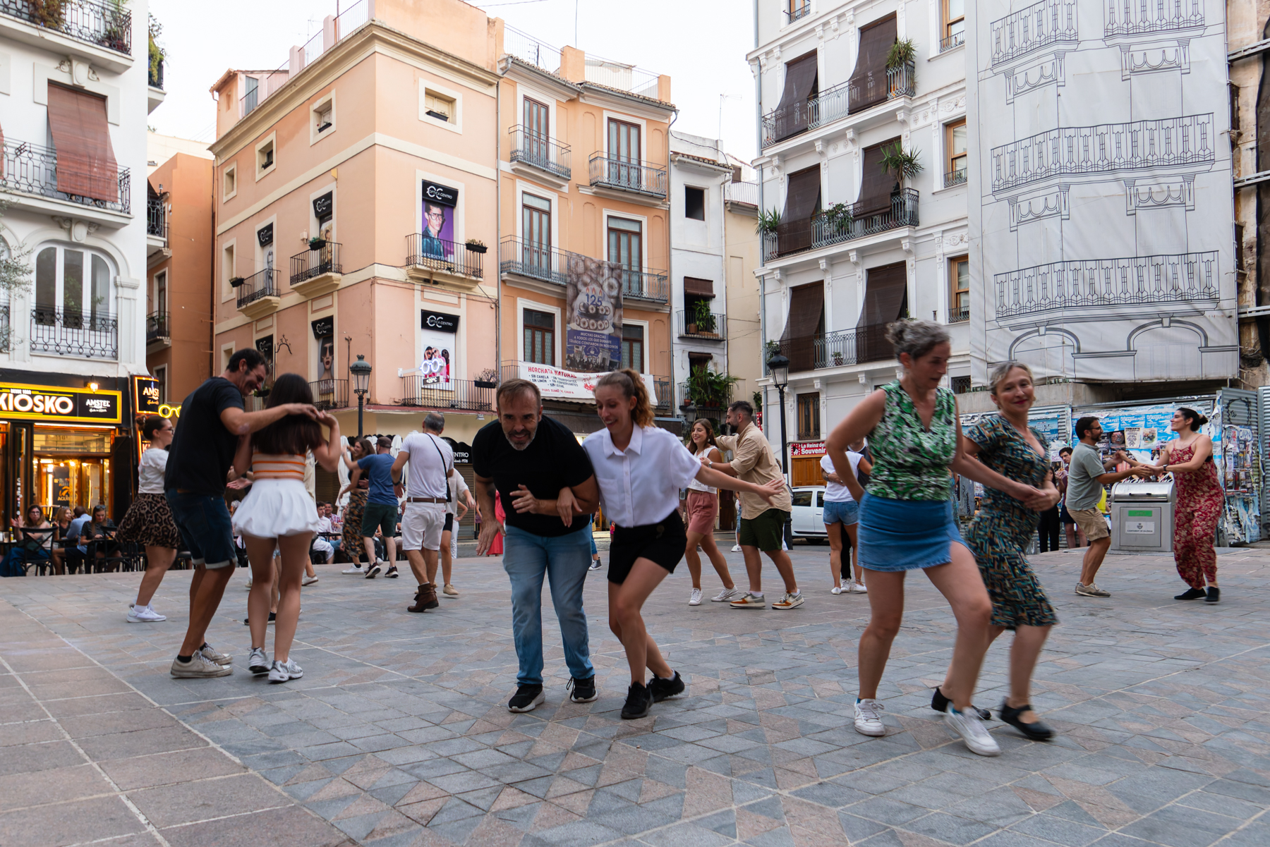 Locals dancing in the Plaza Doctor Collado in Valencia.