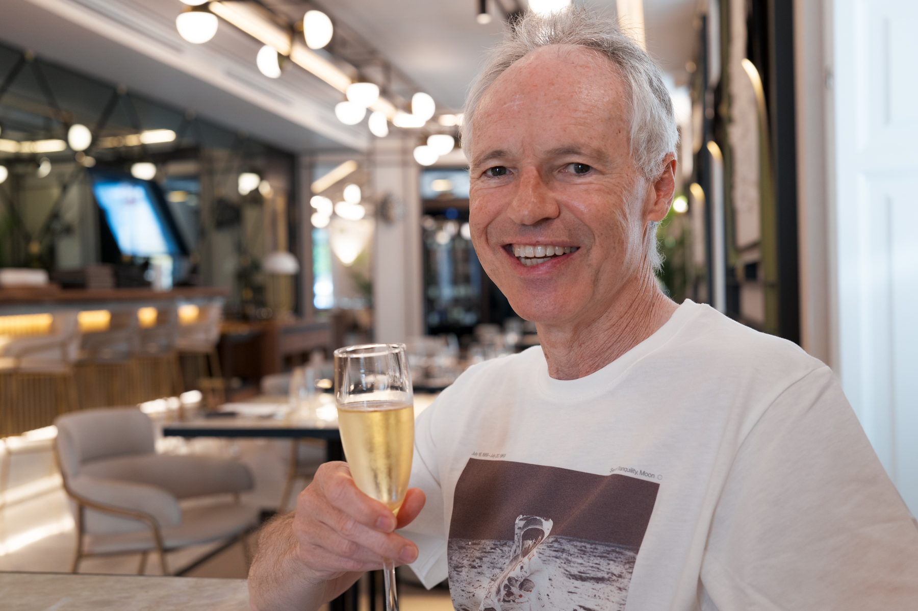 Keith, enjoying a glass of champagne with breakfast.