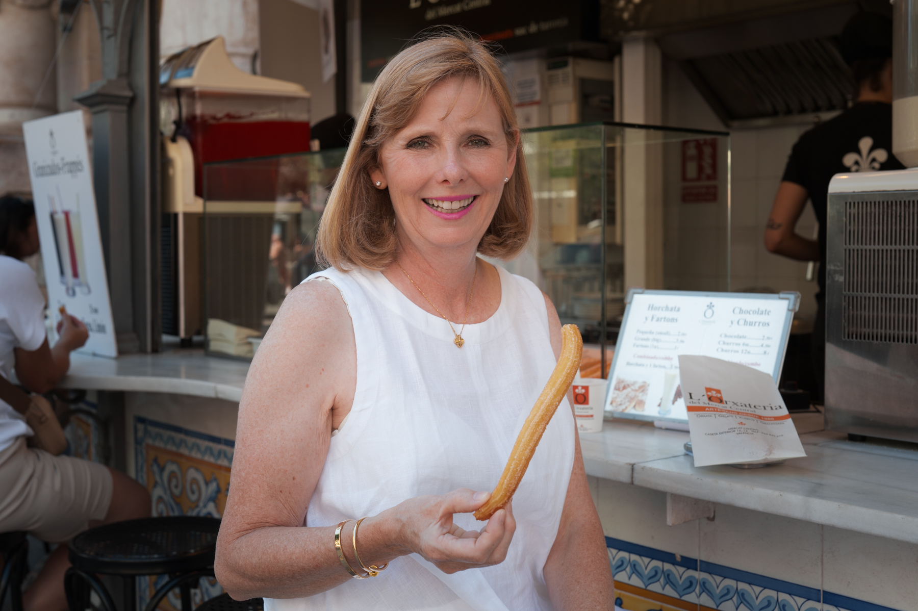 Andrea, with churro in hand in Valencia.