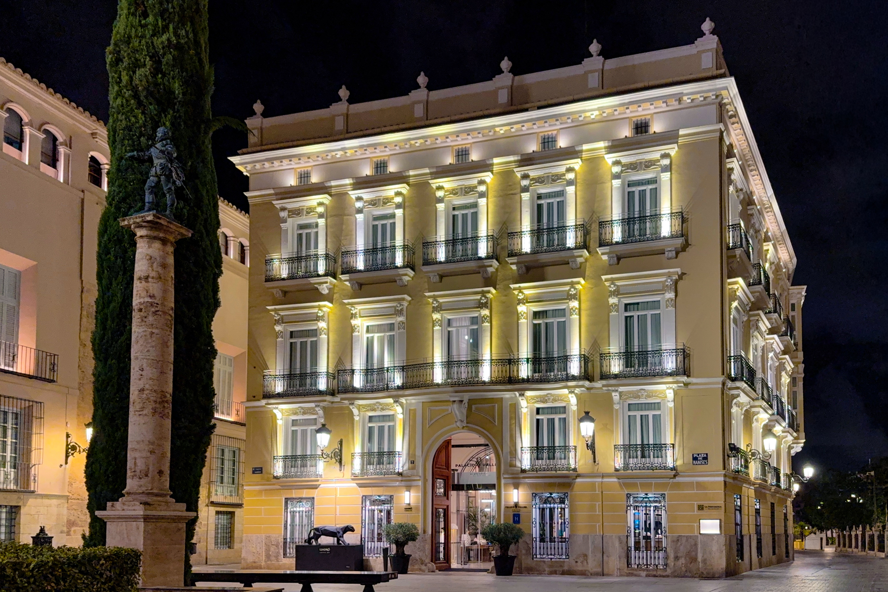 The Palacio Vallier Hotel at night in Valencia.