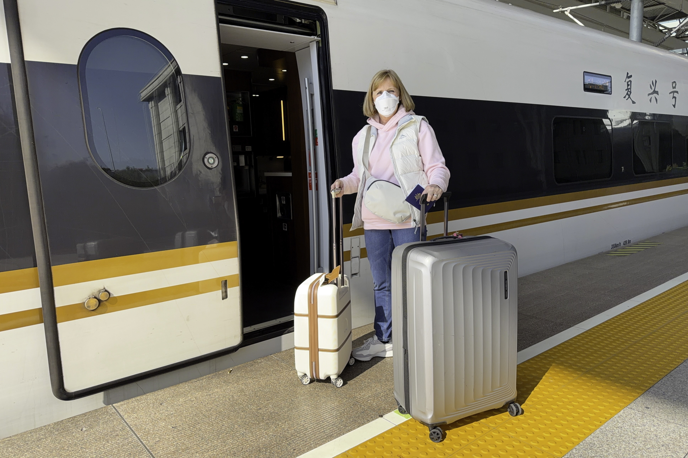 Andrea, boarding the train for Beijing.