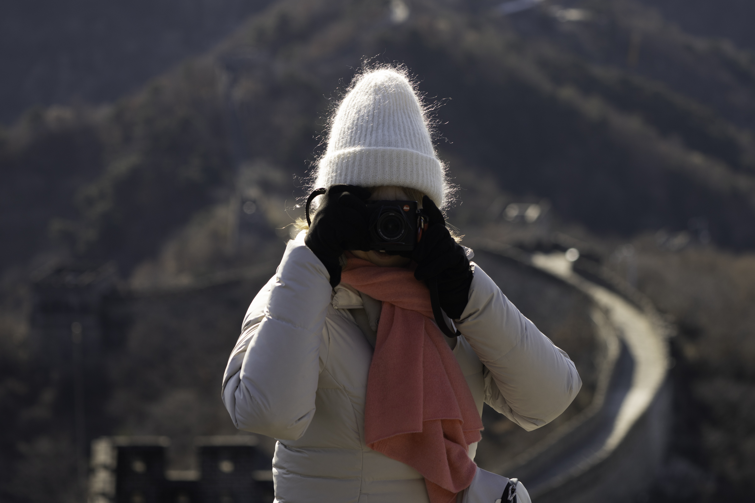 Andrea (taking a photo), on the Great Wall.